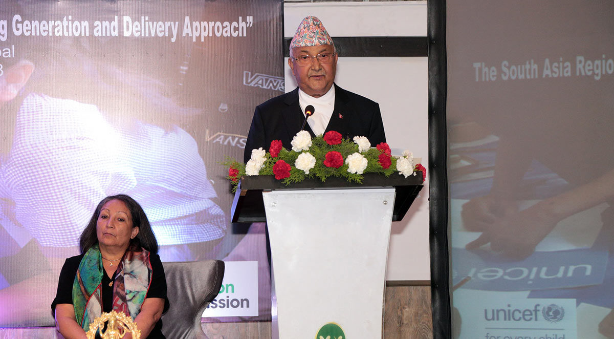 Prime Minister of Nepal Khadga Prasad Oli opening conference in Kathmandu with Regional Director for UNICEF South Asia Jean Gough. Photo: UNICEF