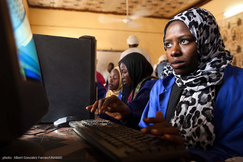 woman in darfur on computer